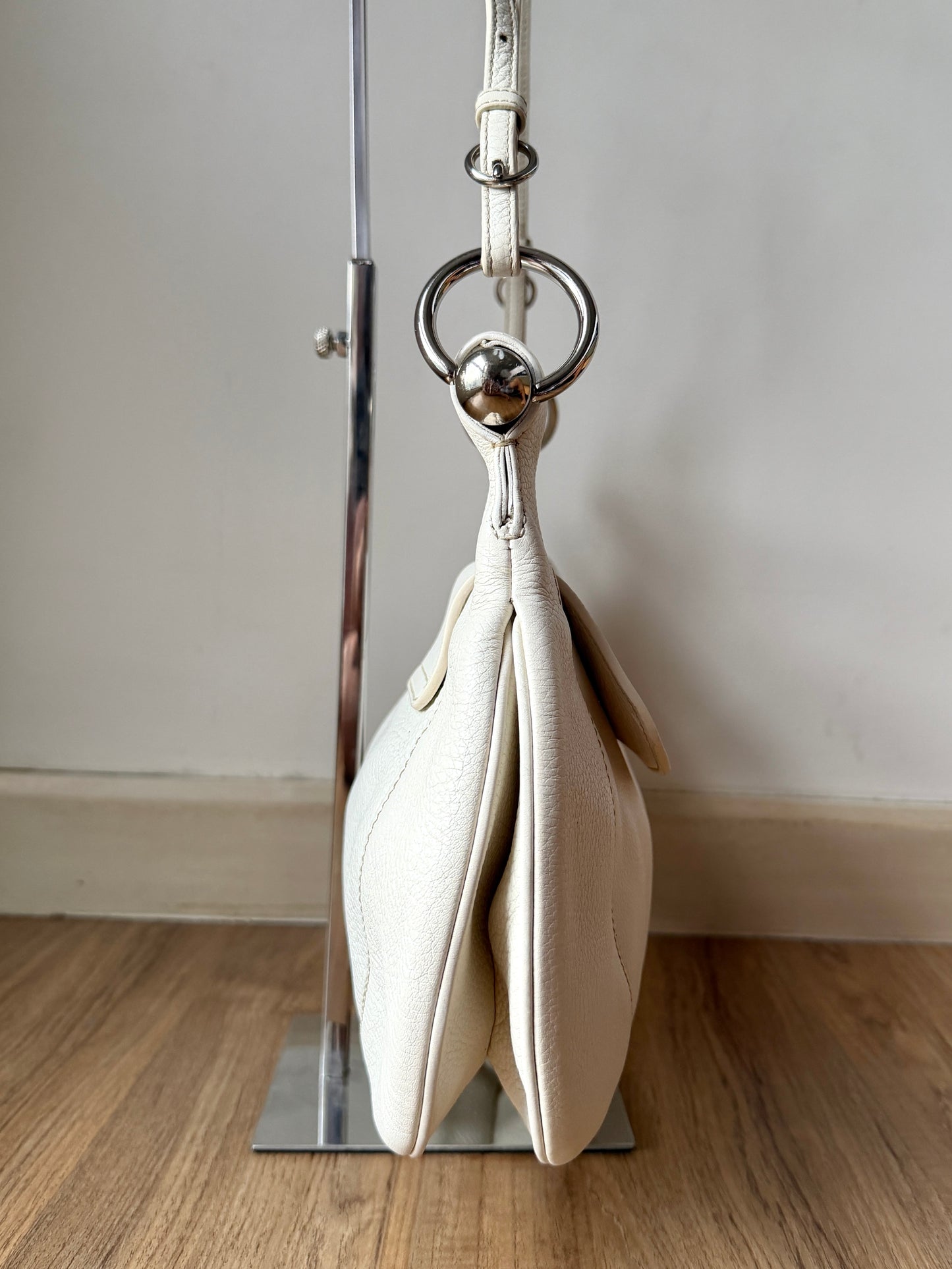 AVAILABLE | Prada Vitello Daino White Pebbled Halfmoon Swing Bag – White