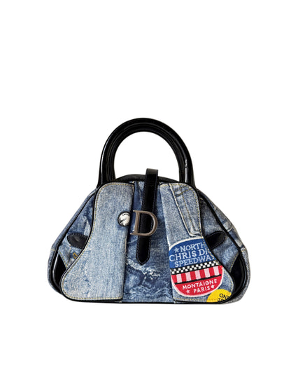 AVAILABLE | Christian Dior Distressed Denim Speedway Saddle Bowler Bag