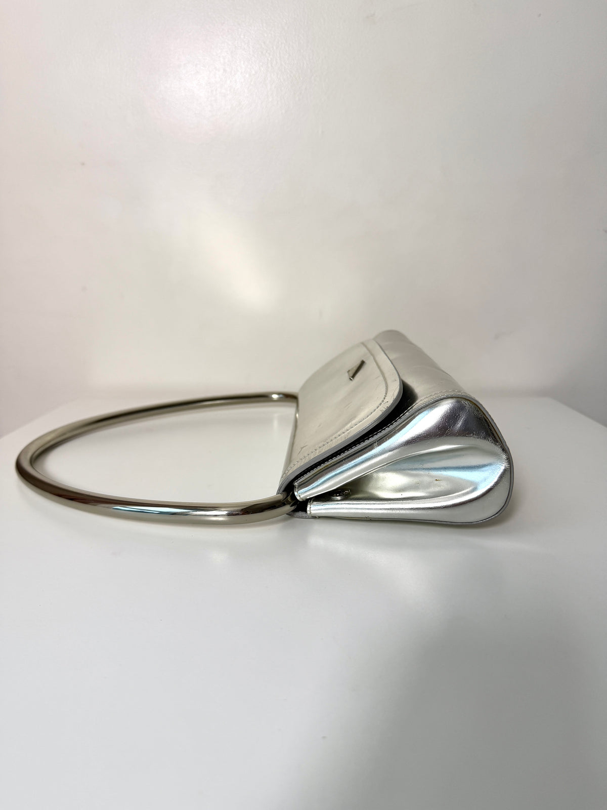 AVAILABLE | Prada Metallic Silver Swing 2003