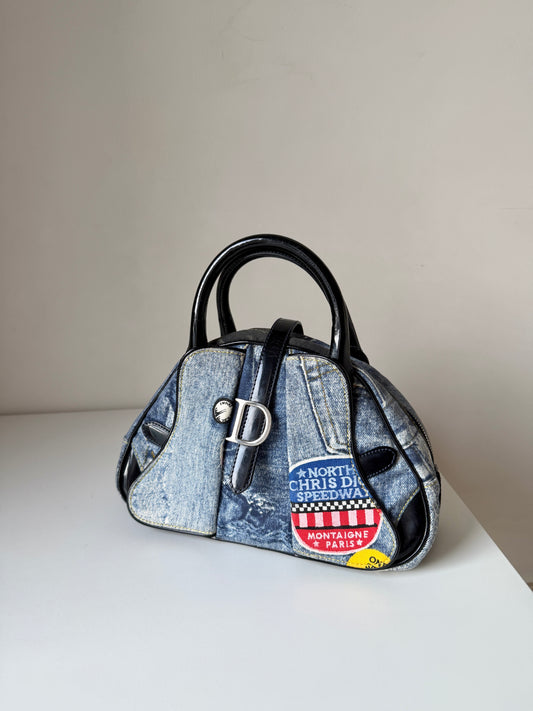 AVAILABLE | Christian Dior Distressed Denim Speedway Saddle Bowler Bag