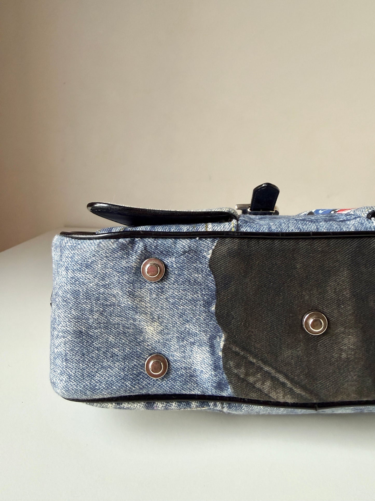 AVAILABLE | Christian Dior Distressed Denim Speedway Saddle Bowler Bag