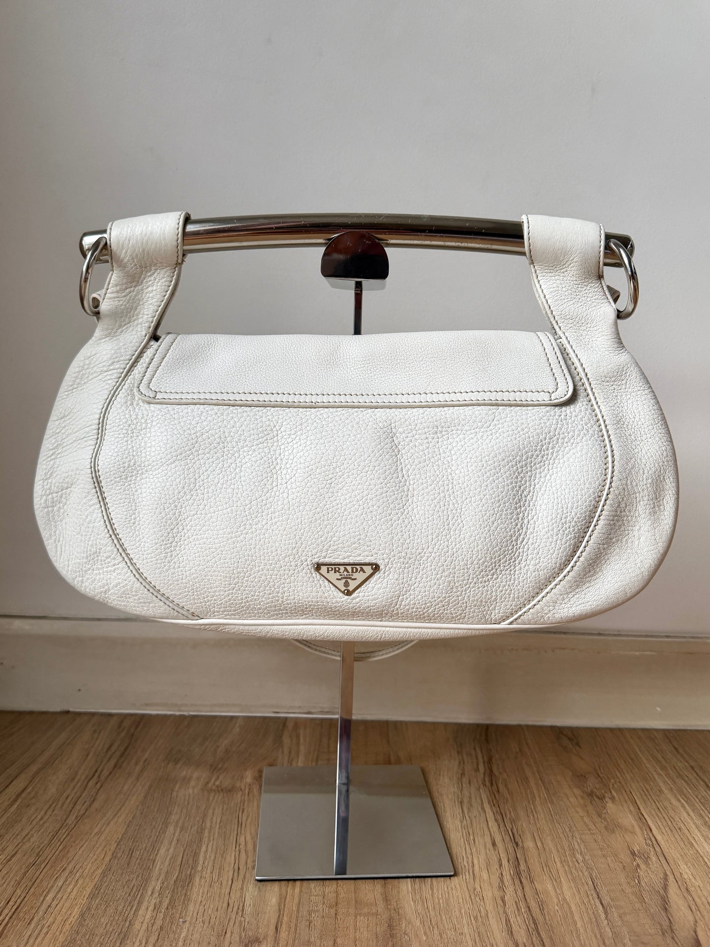 AVAILABLE | Prada Vitello Daino White Pebbled Halfmoon Swing Bag – White