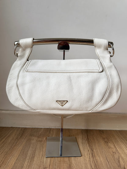 AVAILABLE | Prada Vitello Daino White Pebbled Halfmoon Swing Bag – White