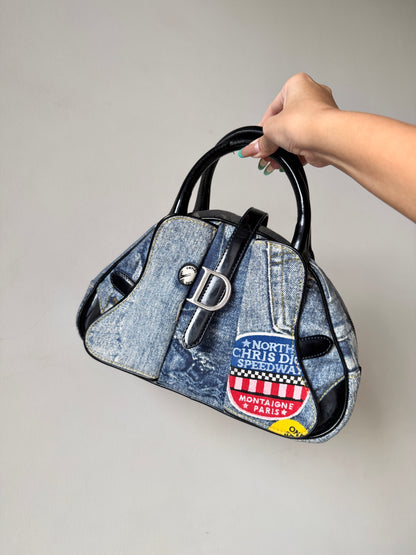 AVAILABLE | Christian Dior Distressed Denim Speedway Saddle Bowler Bag