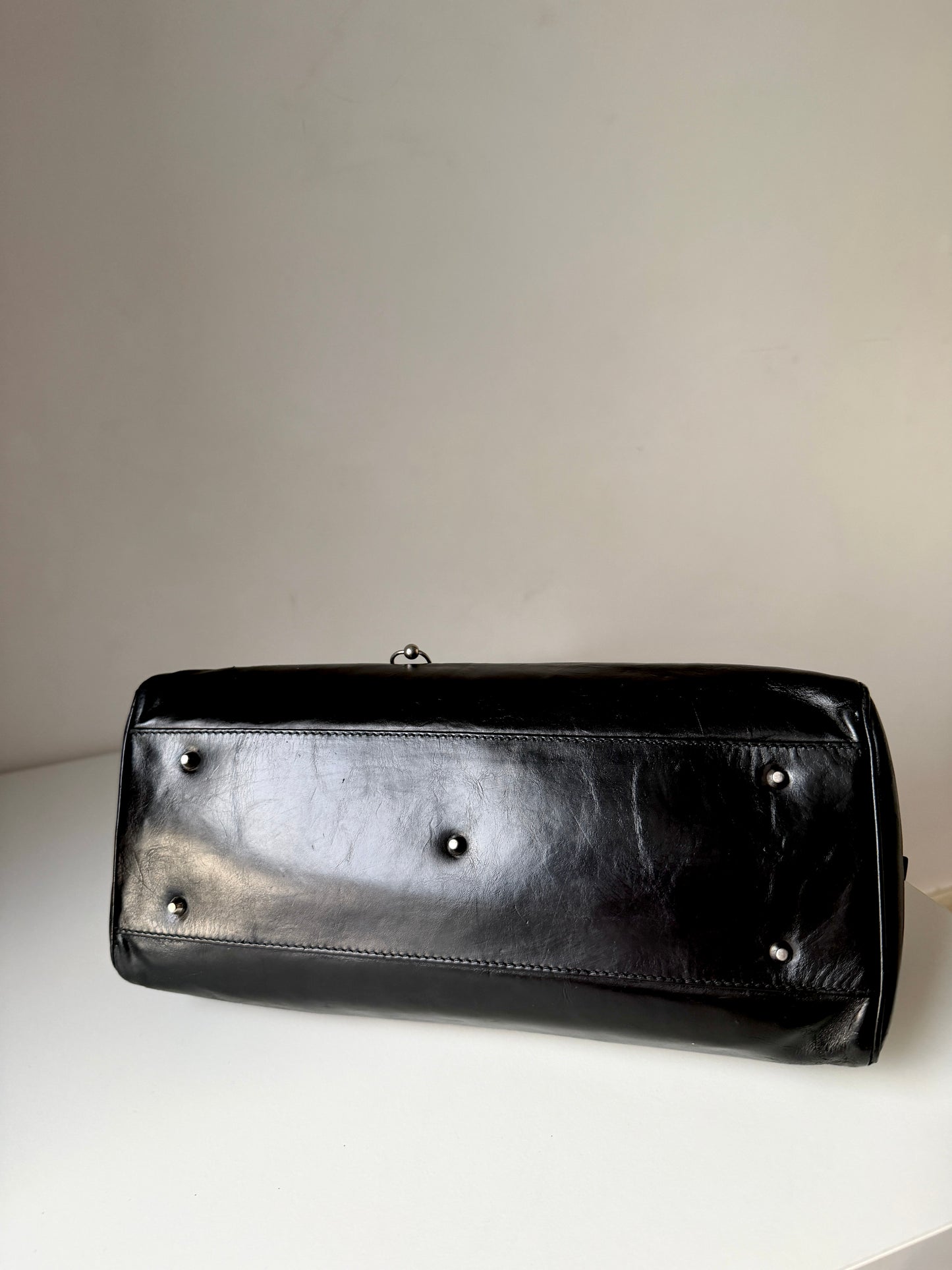AVAILABLE | Christian Dior Hardcore Pierced Boston Bag – Black